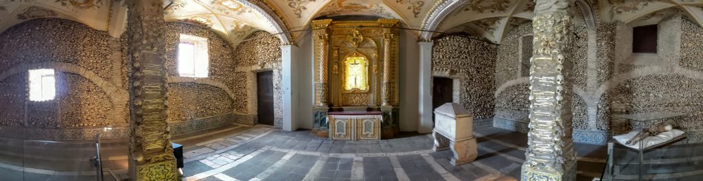 This image has an empty alt attribute; its file name is Evora_Capela_dos_Ossos_front_pano-1024x264.jpg